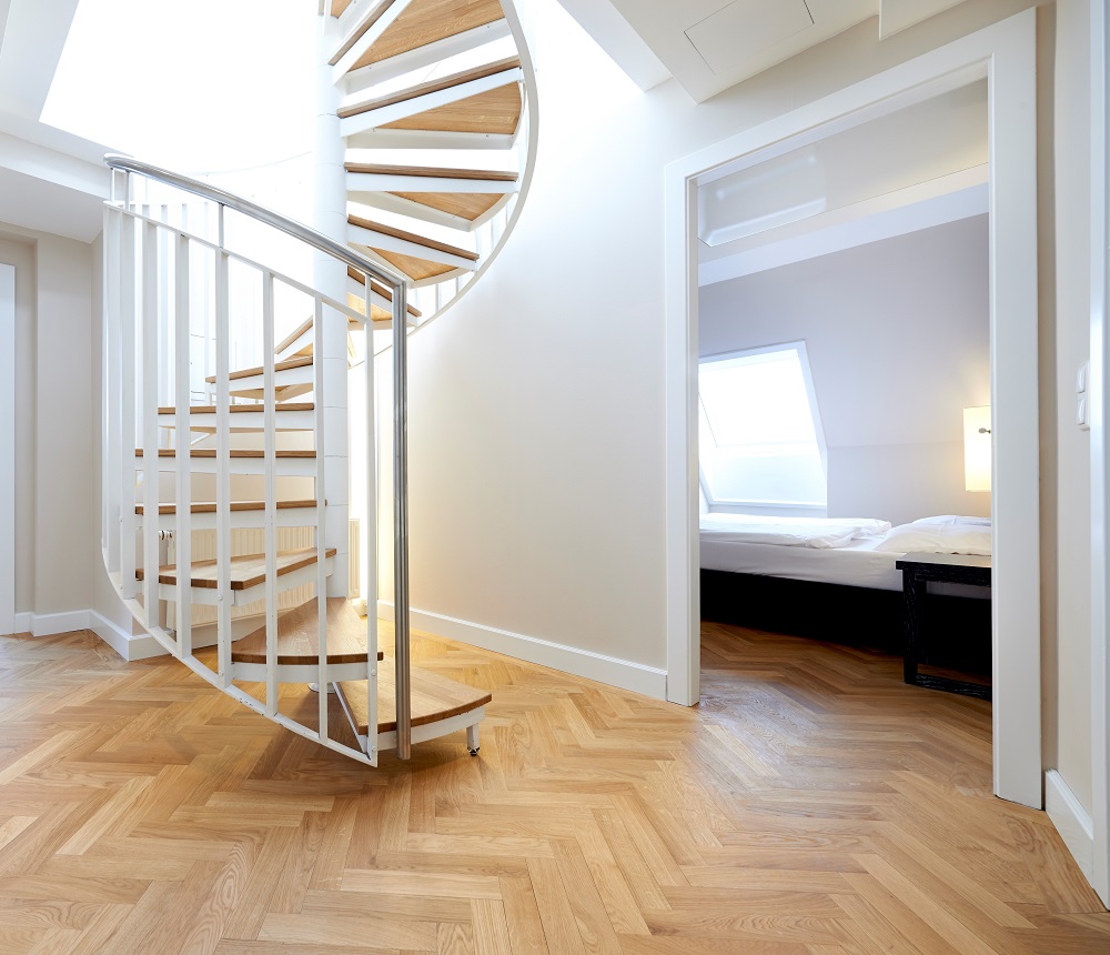 Wendeltreppe in Dachgeschosswohnung im Apartmenthotel Singerstrasse 21/25